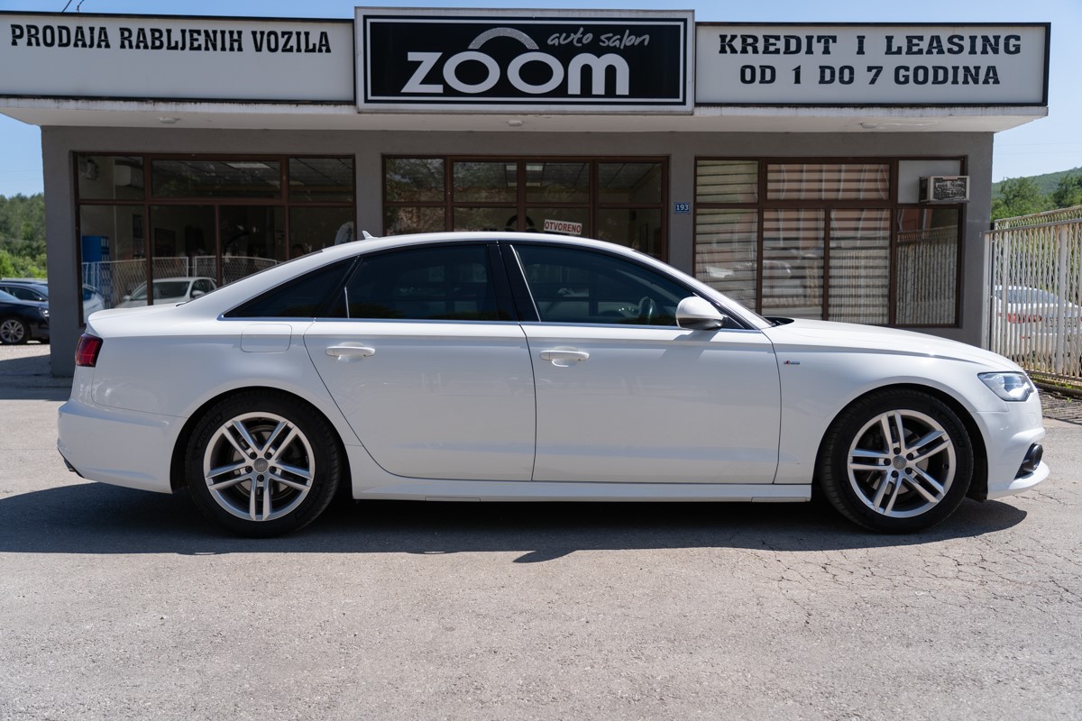 Audi A6
 2,0 TDI S-line
