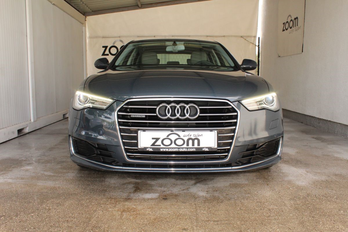 Audi A6
 3.0 TDi V6 Quattro Business Line