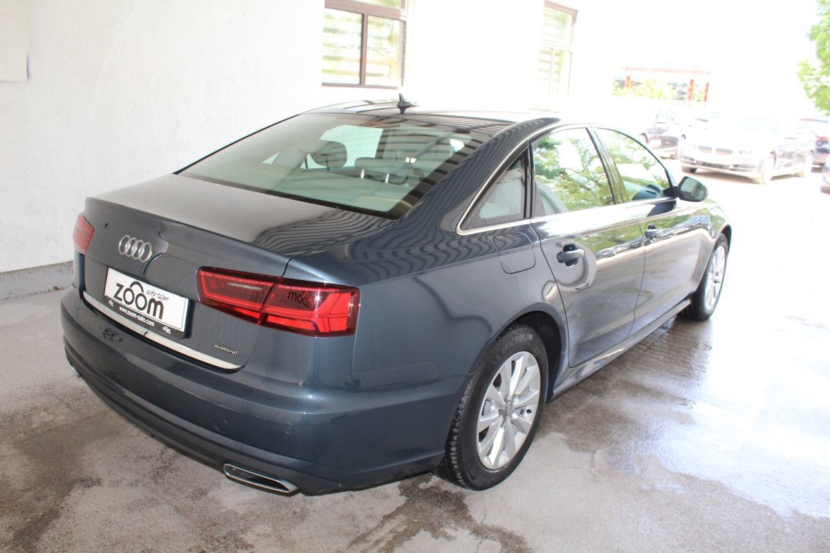 Audi A6
 3.0 TDi V6 Quattro Business Line